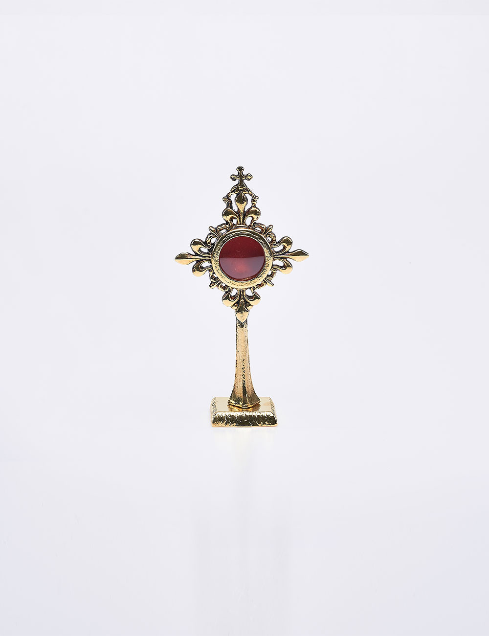 Reliquiario a forma di croce in bronzo dorato
