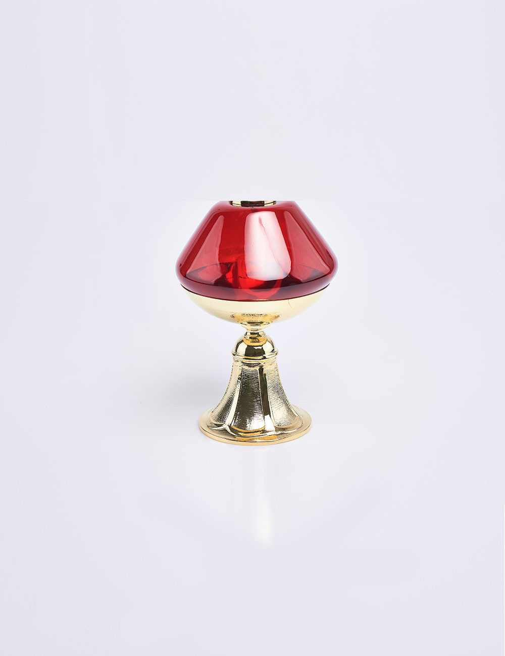 Lampada rossa in vetro con base oro per cera liquida