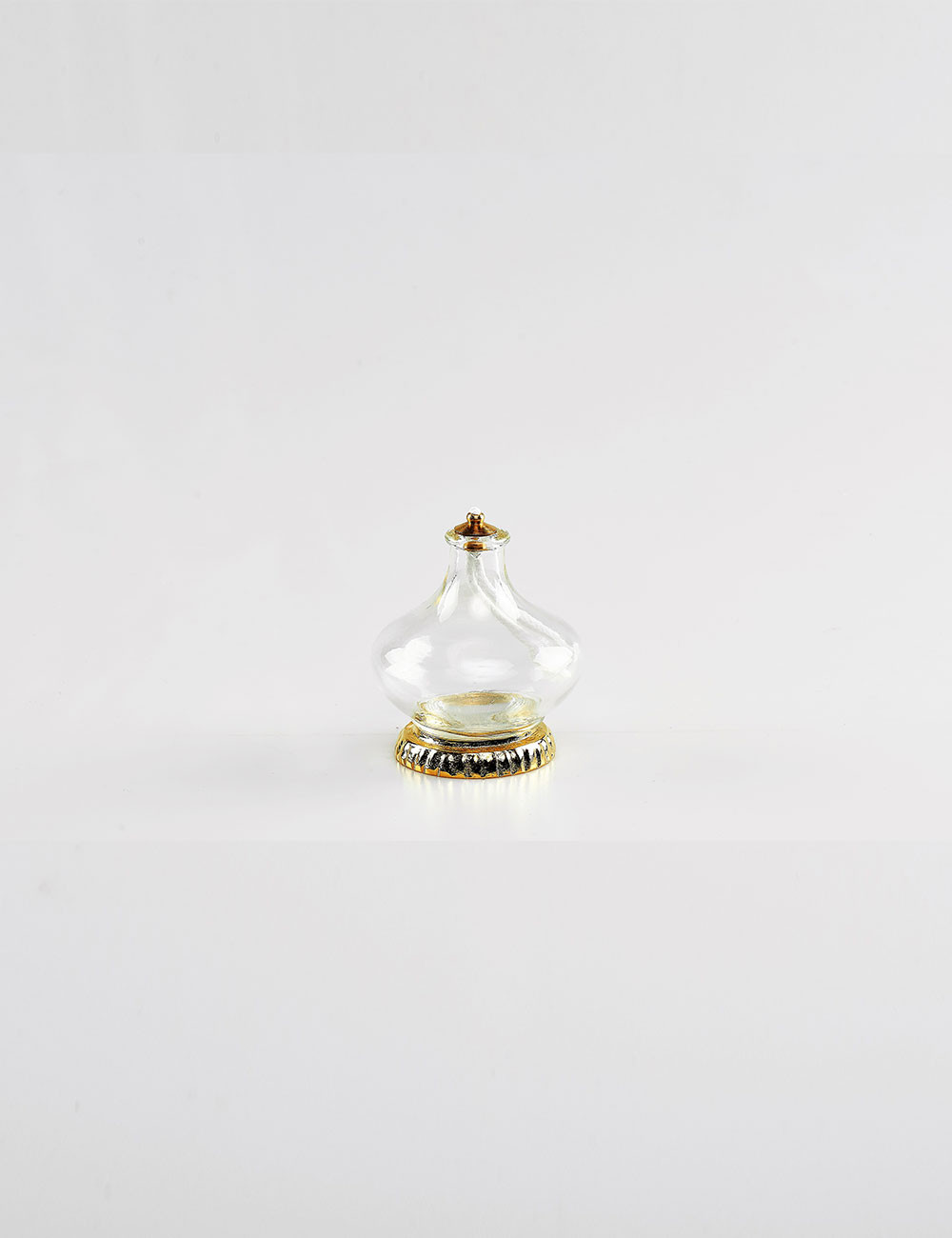 Lampada con base in oro modello Cipollina in vetro trasparente